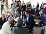 غبارروبی مزار شهدا با حضور وزیر صنعت، معدن و تجارت